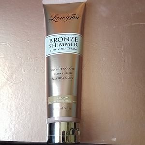 Loving tan bronze shimmer in shade MEDIUM!